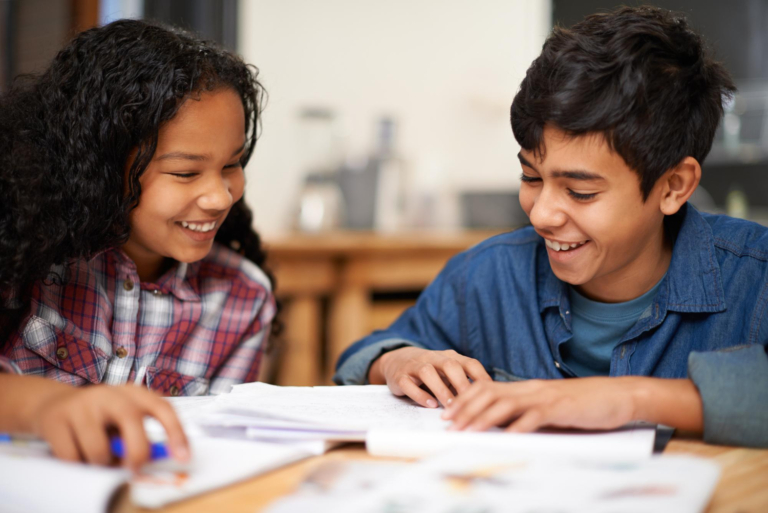 Children homework and classroom teamwork for education assignment